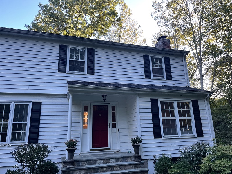 Traditional WIlton colonial needing window replacement 